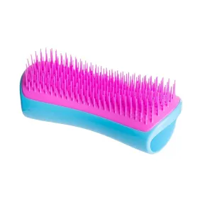 Dog deshedding brush by Pet Teezer